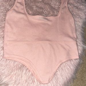 Light pink cropped top , very soft , rubbed tank top swoop bottom